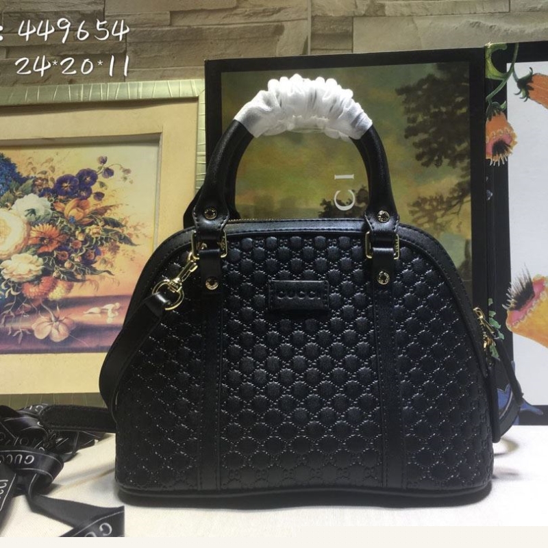 G*u*i top handle bags